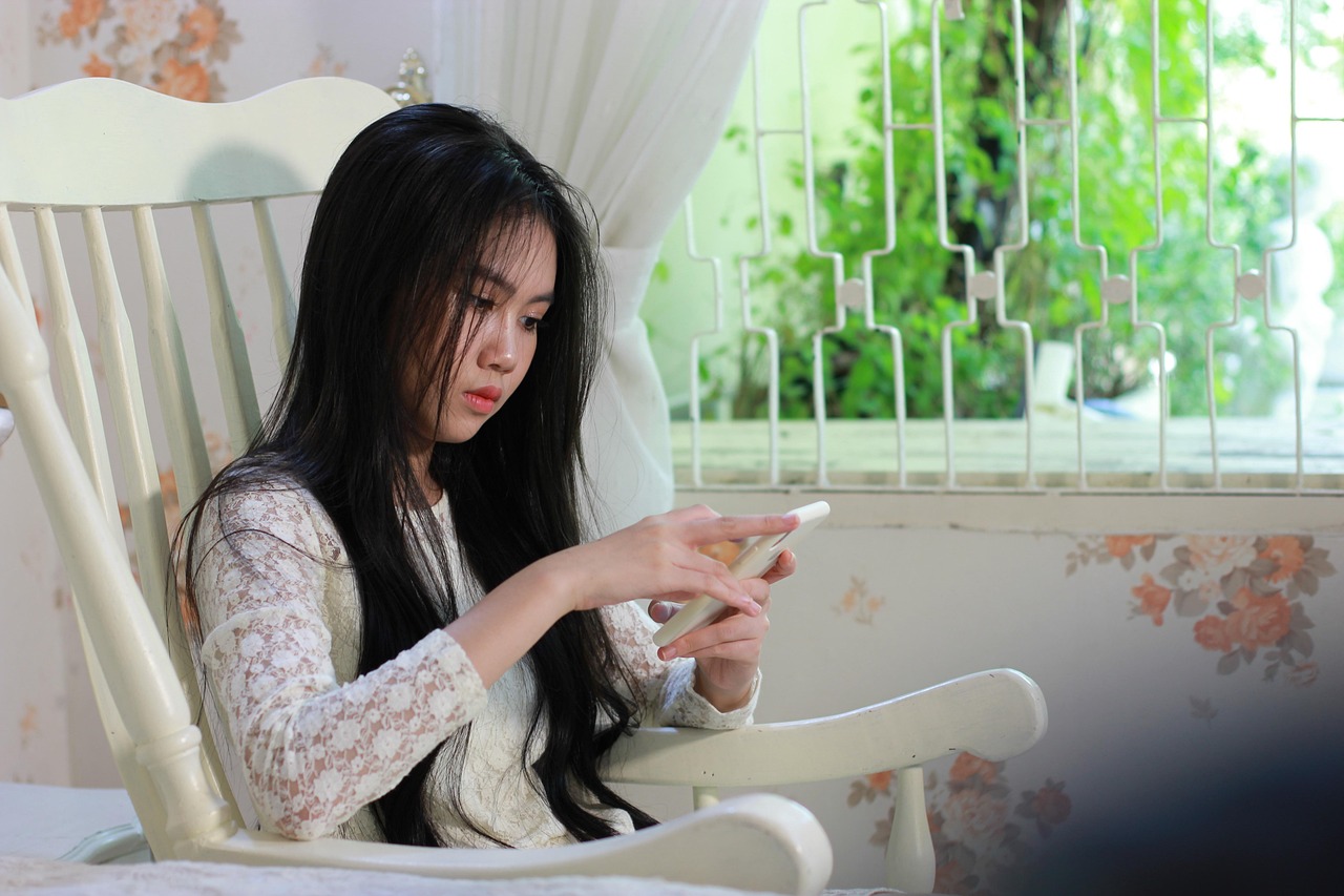 woman, sitting, indoors, home, phone, technology, female, girl, portrait