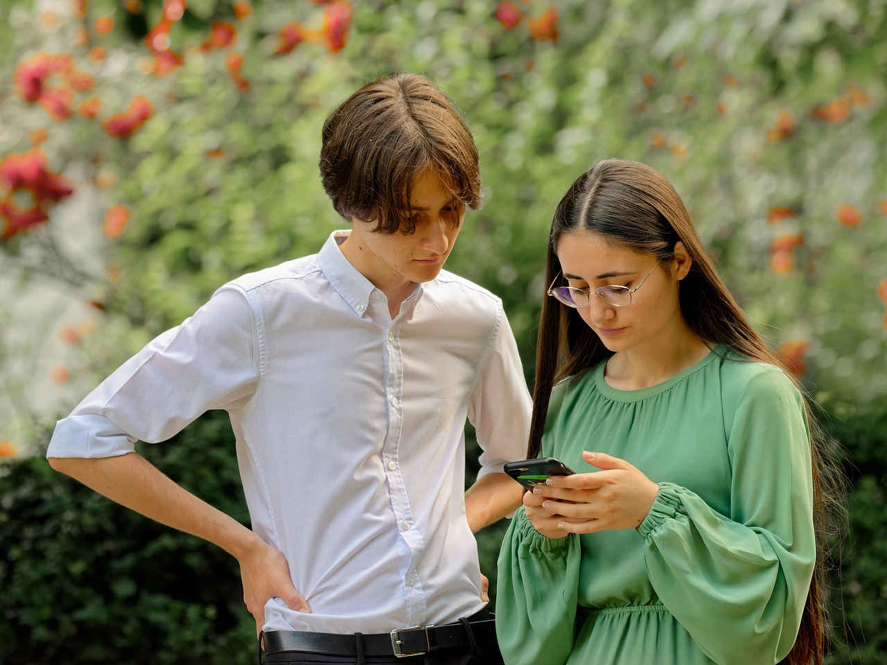 young couple, man, woman, people, looking, together, smartphone, outdoors, lifestyle, people, people, people, people, people