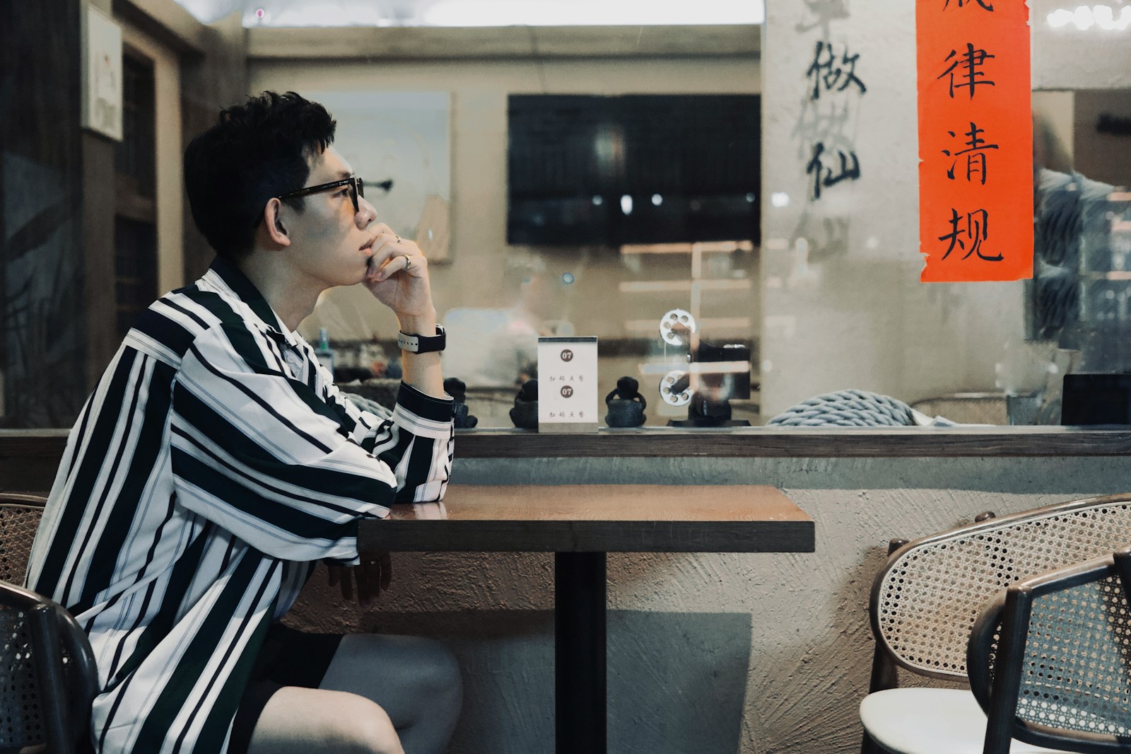 a person sitting at a table